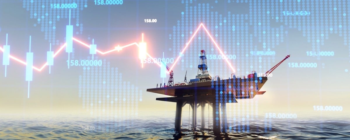 Plateforme pétrolière offshore en mer au coucher du soleil et diagrammes de croissance en néon, changement de dynamique des prix.